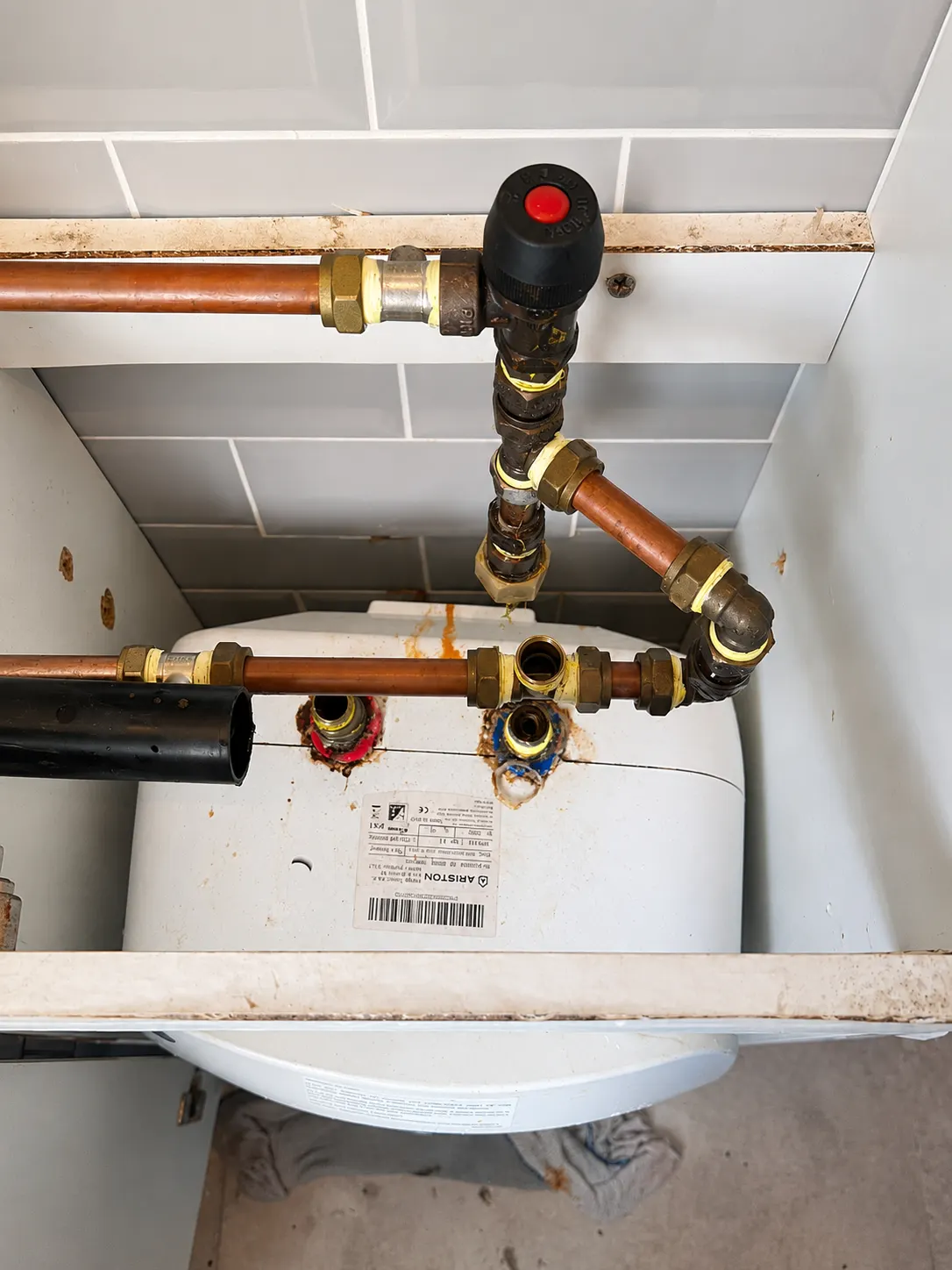 Hot water cylinder pipework and valves reworked at a property in Greater Manchester