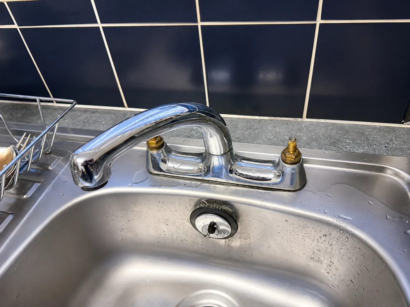 New kitchen mixer tap fitted after an under-sink leak repair in Oldham