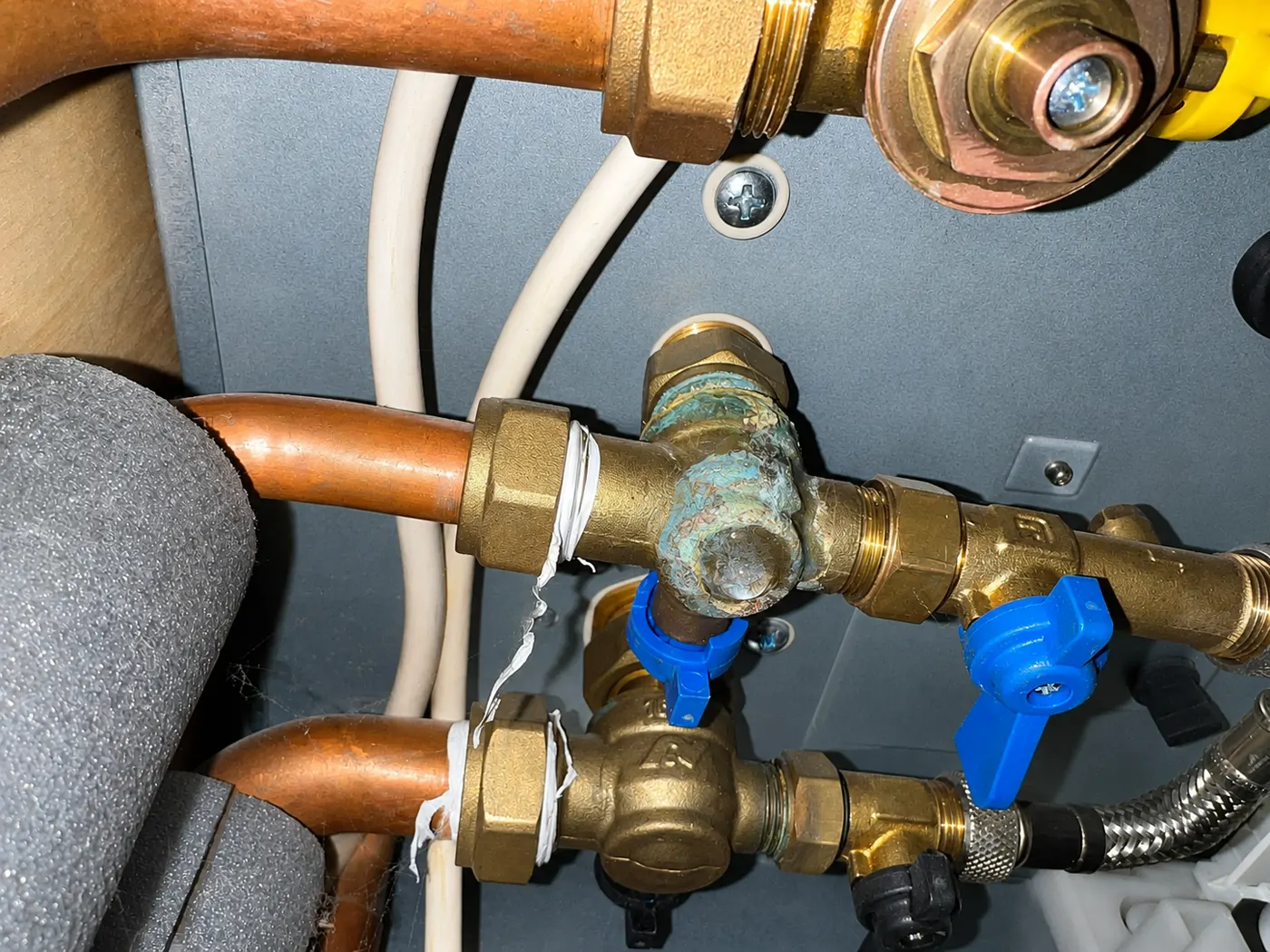 Outdoor garden tap and isolation valve fitted to an external wall
